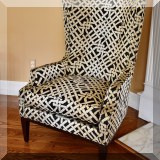 F13. Custom upholstered wing chair with geometric fabric. 47”h x 20”w x 38”d 